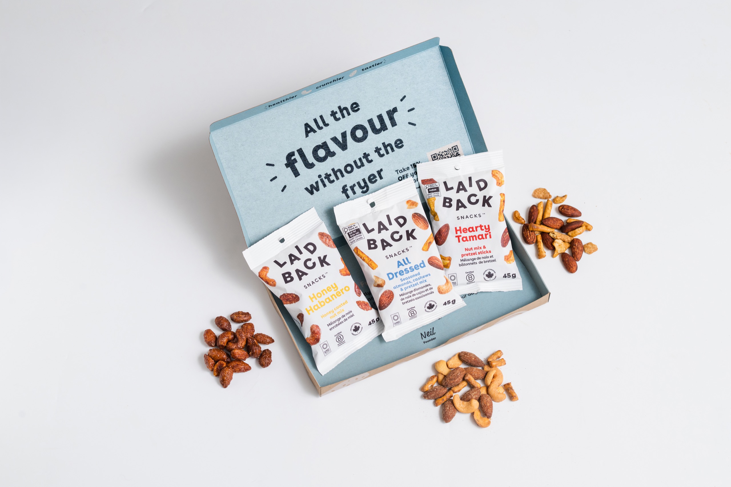 Laid Back Snacks sample box with three 45g snack pouches