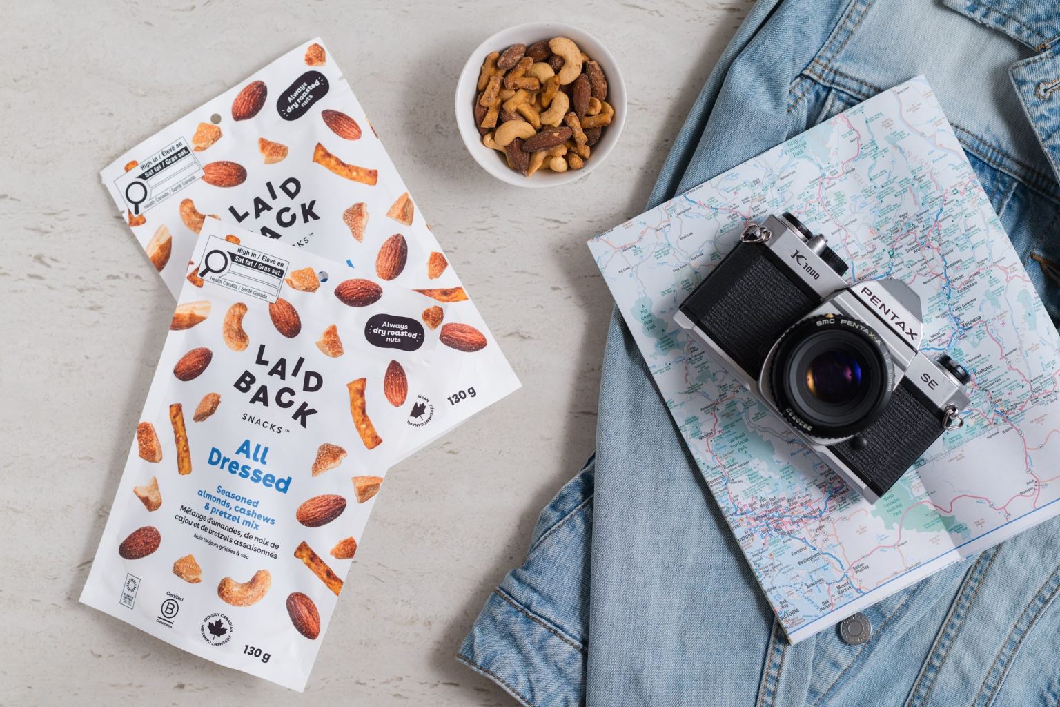 Laid Back Snacks All Dressed — lifestyle flat lay